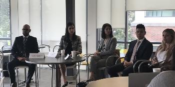 Articling students sitting as part of a panel