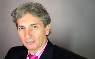 Image: Irvin Schein sitting and looking at camera